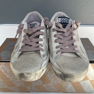 Golden goose. Size 37. Fine glitter with pink laces.